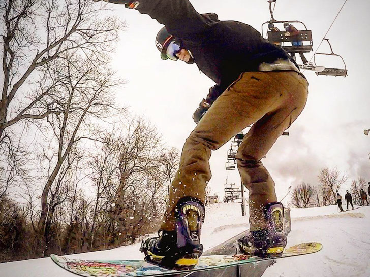 Close of image of a snowboarder in a terrain park at Snow Creek
